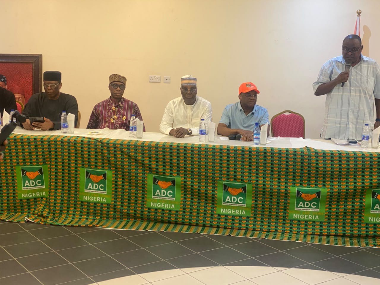 ADC leaders greeting each other before the press